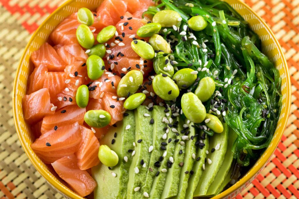 Freshly prepared Hawaiian poke bowls, emphasizing the freshness and authenticity of the cuisine.
