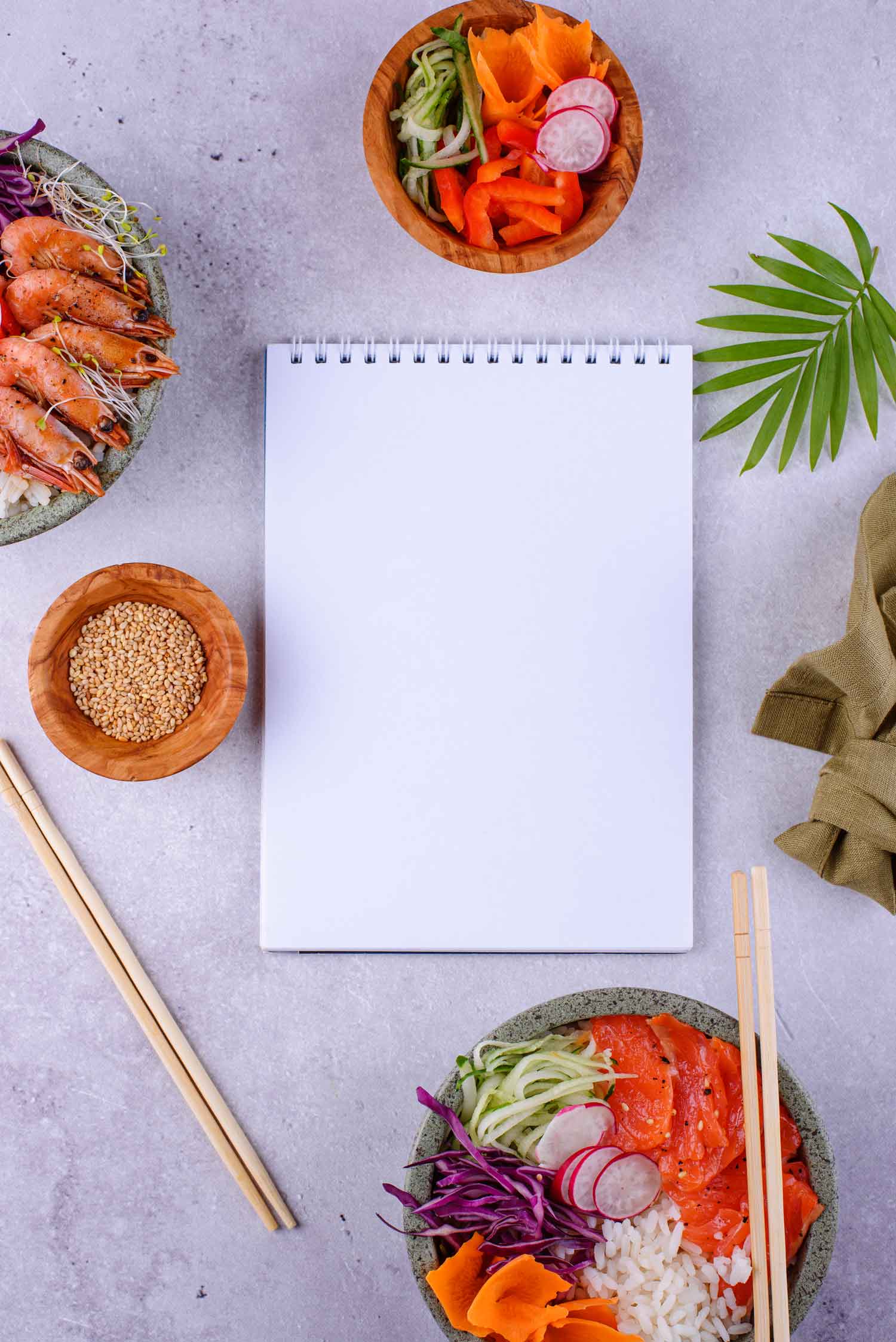 A detailed display of separate poke bowl ingredients, perhaps laid out before assembly.
