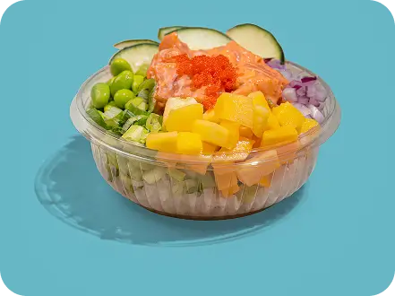 Teriyaki salmon poke bowl with fresh vegetables, mango, and sesame seeds at Union Square location.