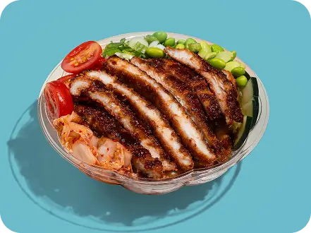Juicy meat poke bowl with tomatoes, kimchi, edamame, and green onions at Poke Bowl NY, Times Square.