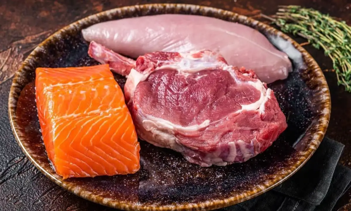 Salmon, tuna, and pork on a plate, discussing poke bowl protein calories and nutrition benefits.