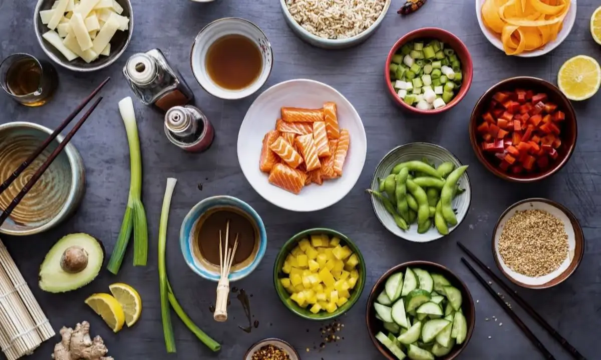 Salmon poke bowl ingredients: fresh salmon, rice, edamame, cucumber, sauces, and garnishes for a nutritious meal.