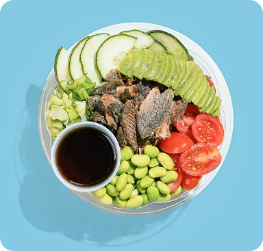 Signature Crack Rice poke bowl with avocado, cucumber, edamame, cherry tomatoes