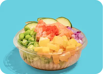 Poke bowl with diced mango, edamame, cucumber, red onion, fish roe and creamy dressing