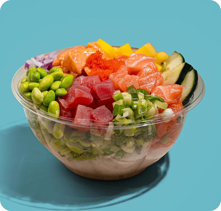 Hawaiian poke bowl with tuna, salmon, edamame, cucumber, mango