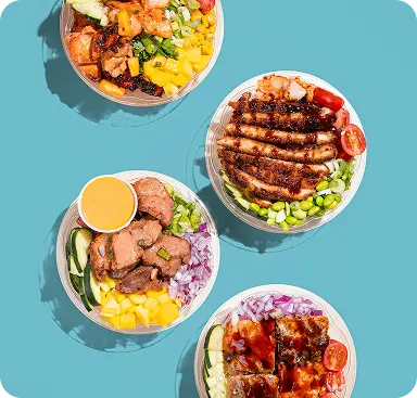 Four colorful poke bowls with grilled chicken, steak, mango, edamame